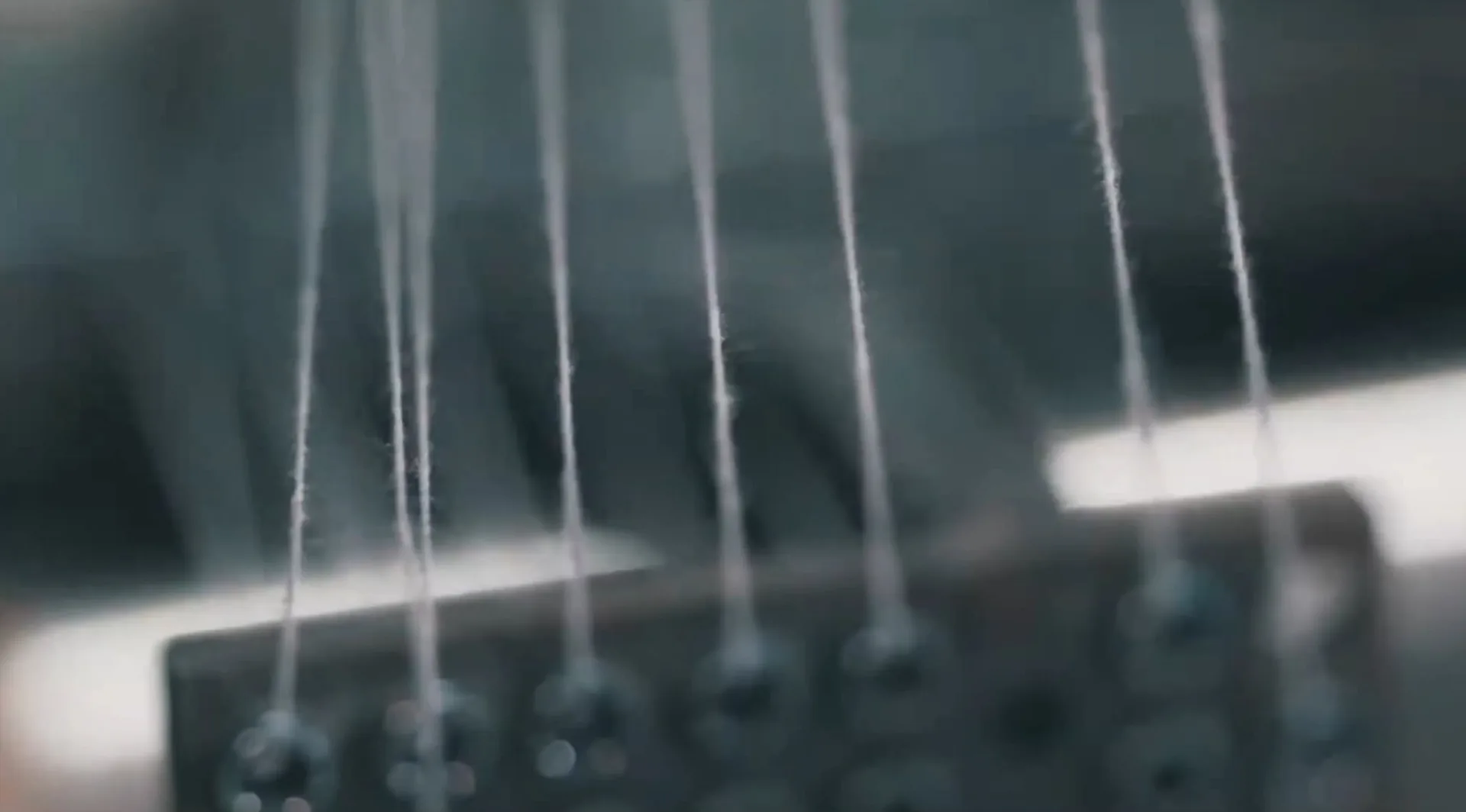 Close-up of vinyl yarns on the weaving loom