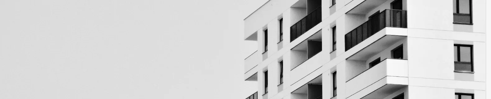 White apartment building with balconies