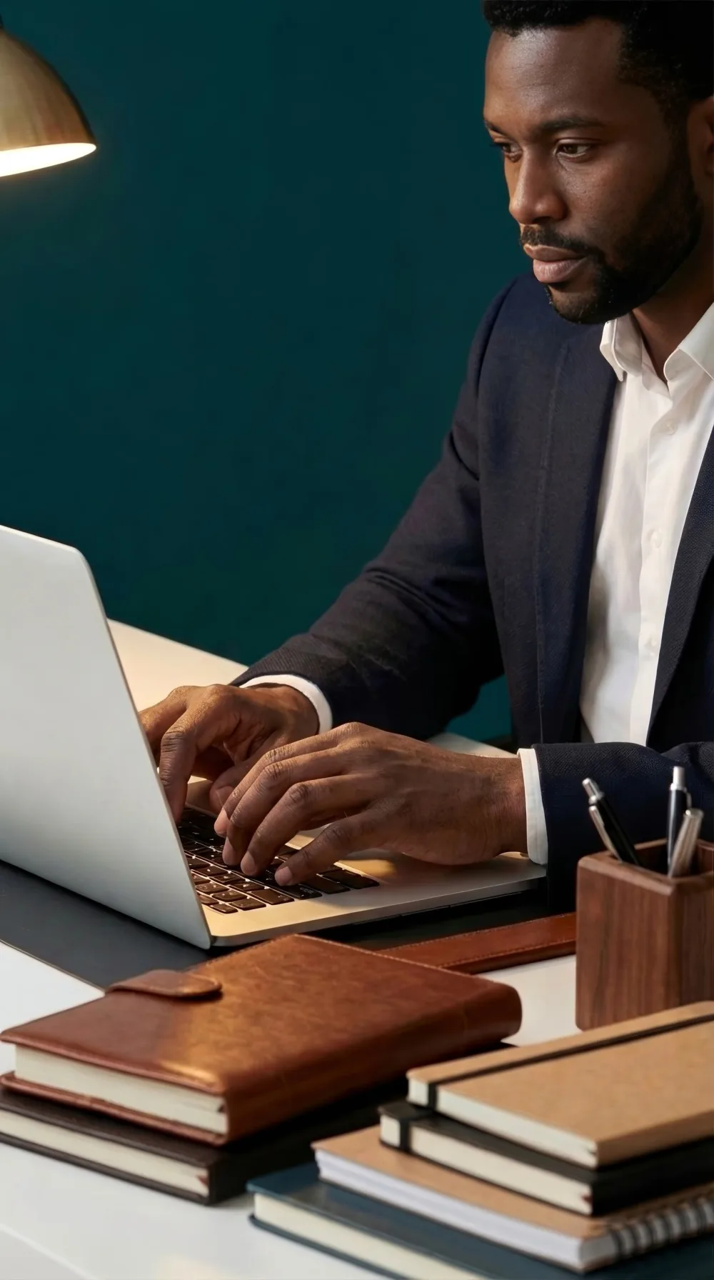 Urban Surfaces project success manager working at a laptop